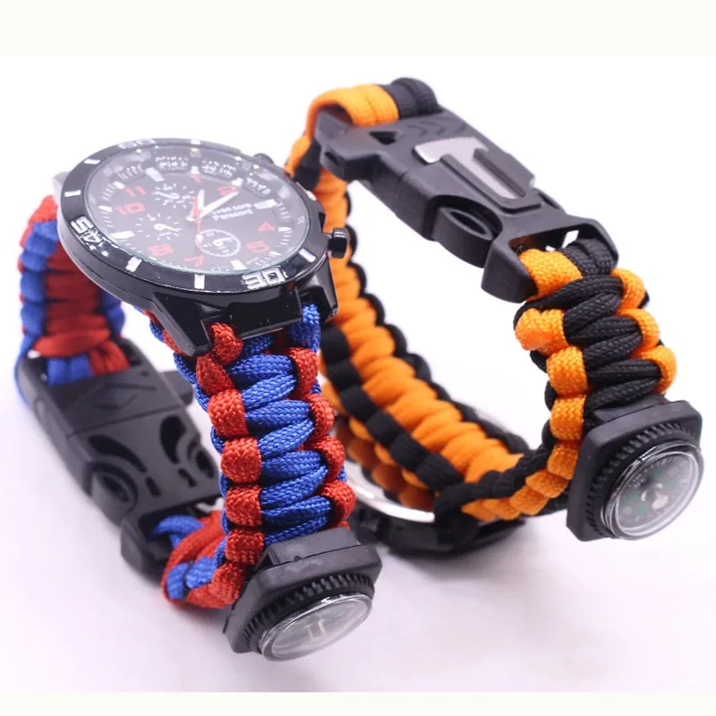 Fire Starting Kit - นาฬิกาอเนกประสงค์สำหรับกิจกรรมกลางแจ้ง พร้อมเชือกถักแบบสร้อยข้อมือ มีไฟแช็ก เข็มทิศ และชุดอุปกรณ์เอาตัวรอด ดีไซน์เจ็ดแกนสำหรับการผจญภัย